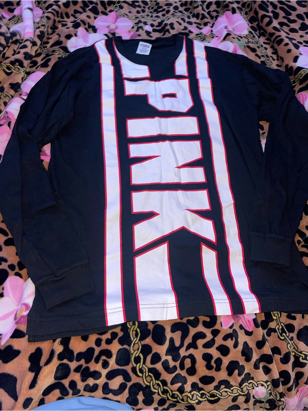 PINK vs white, red and black long sleeve in size medium